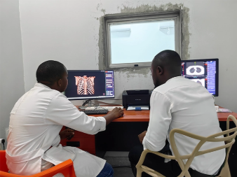 Hands-on clinical staff training for radiology software interface, provided by a reliable medical equipment supplier for Africa.