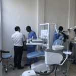 Complete luxury integrated dental chair unit featuring medical monitor and dentist instrument tray.
